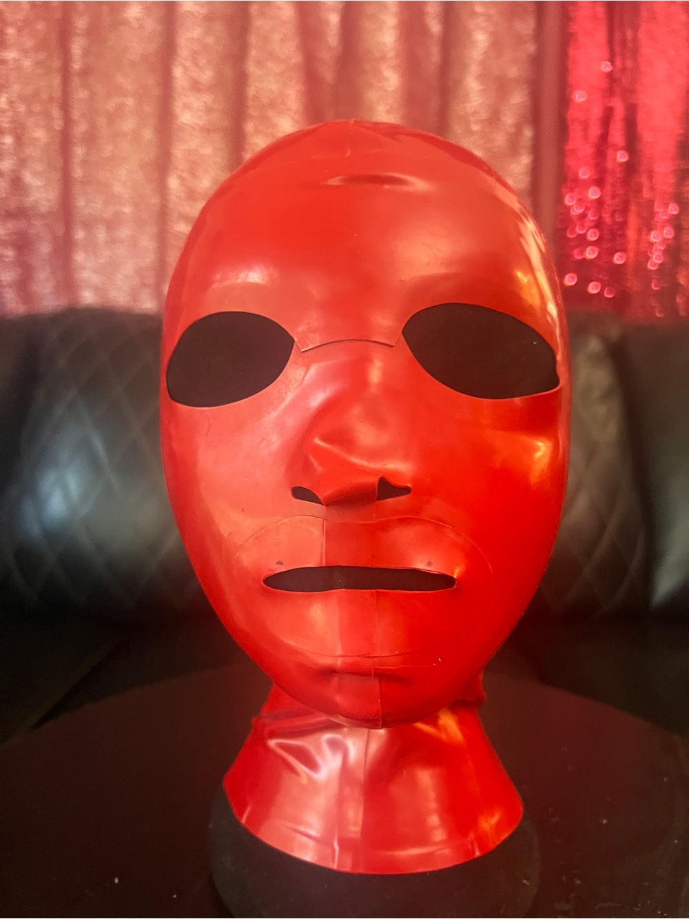 Red latex hood back zipper & buckle. Size Small by Libidex.